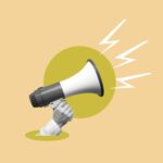 megaphone or loudspeaker on color background, communication concept